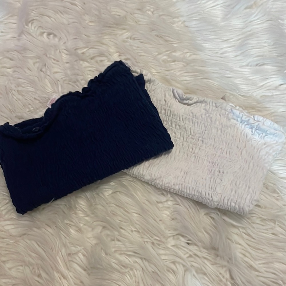 one navy, one white tubes tops